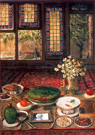 Iranian family in traditional dress celebrating Nowruz around the Haft Sin table.